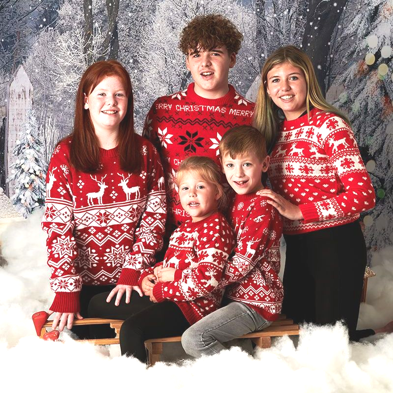 Children in Christmas jumpers during a fun Christmas photoshoot at Oakley Studios on the Luton and Dunstable border