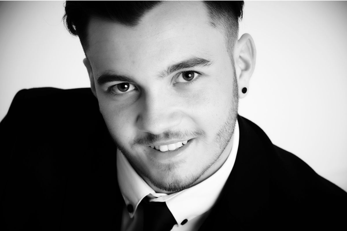Young man in prom outfit during a solo portrait session at Oakley Studios, Luton and Dunstable border