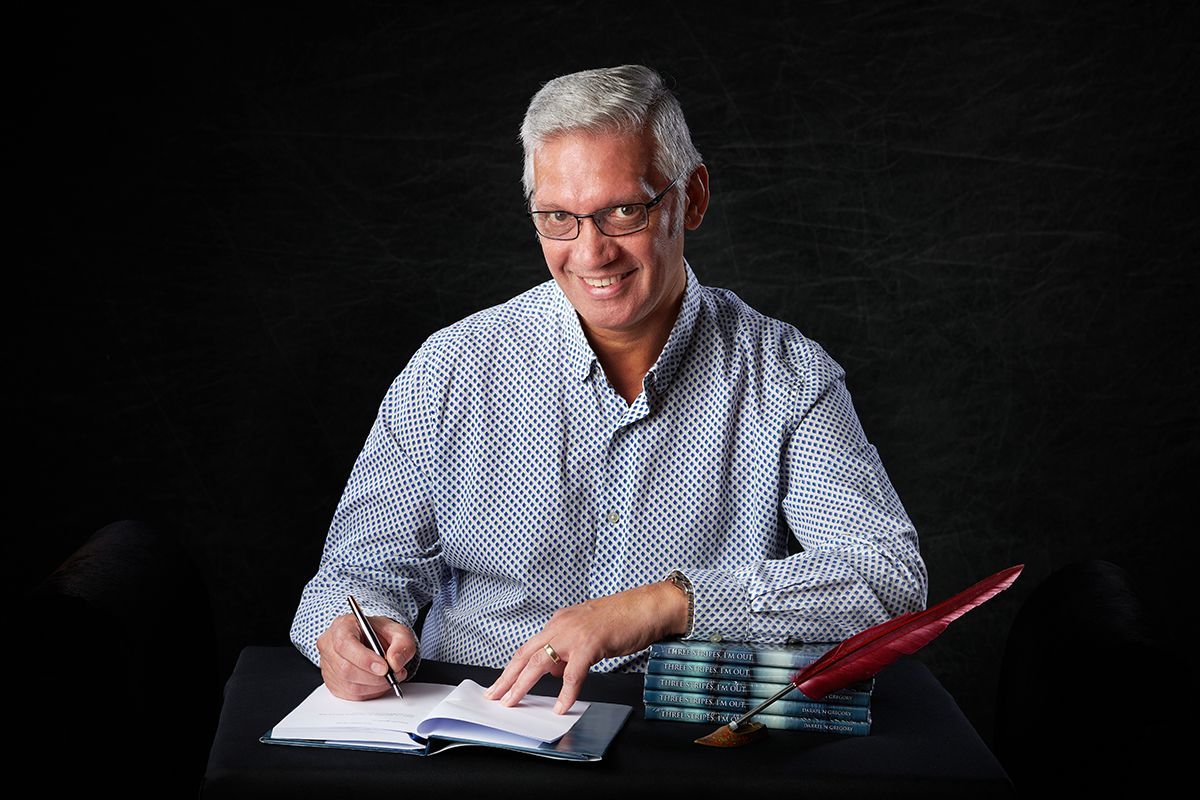 Author Darrell Gregory at his desk — author headshot and portrait photography by Oakley Studios, Luton