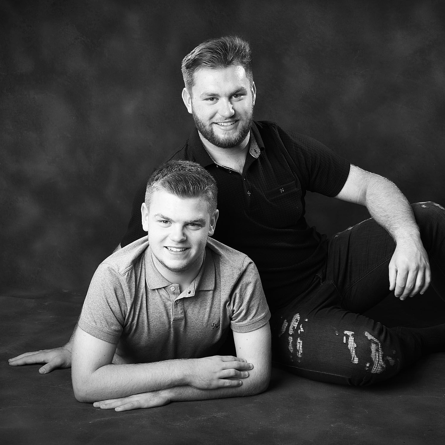 four children, siblings in grey t shirts, Oakley Studios celebration photoshoot in Luton Bedfordshire