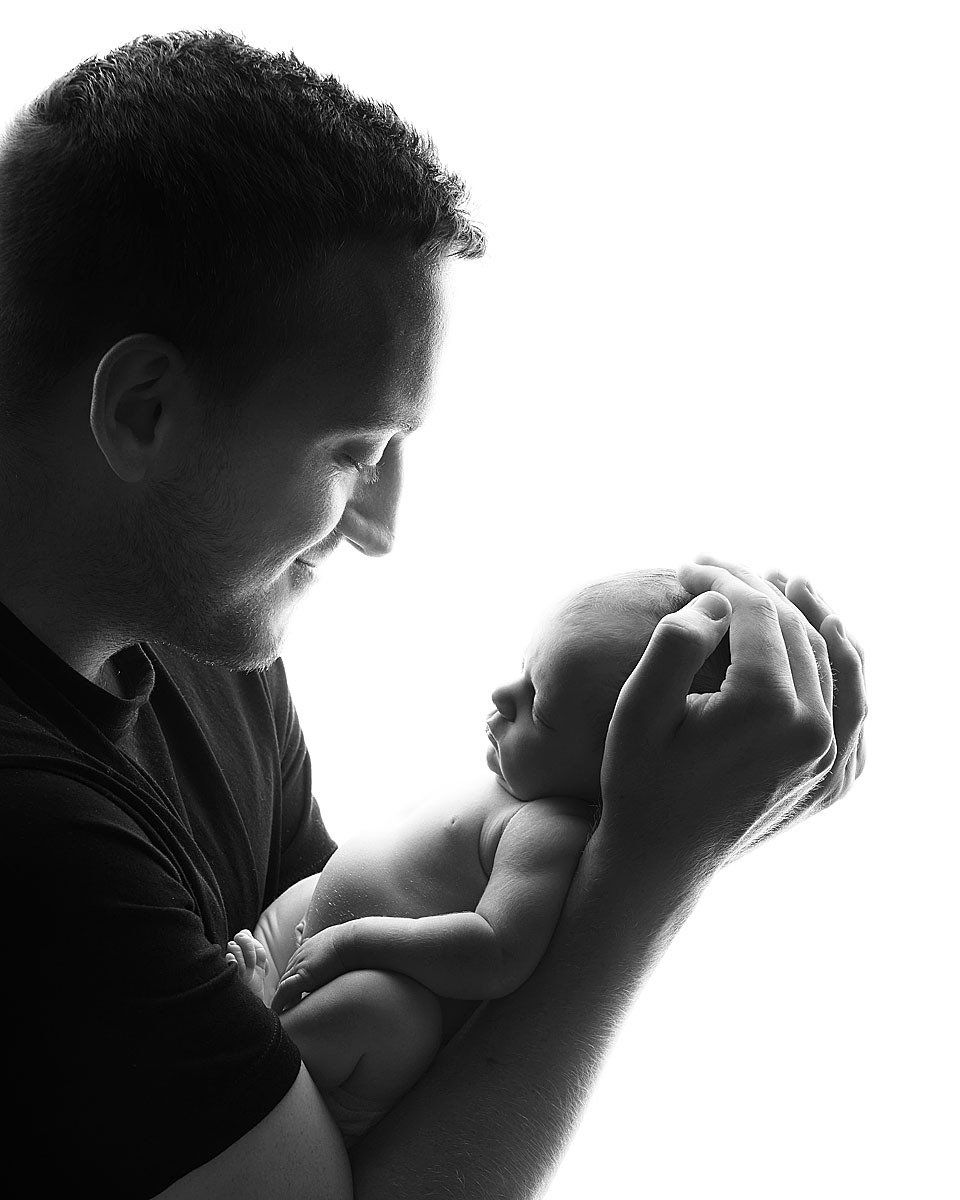 Newborn baby awake during a safe, MPA-certified newborn portrait session at Oakley Studios, Luton