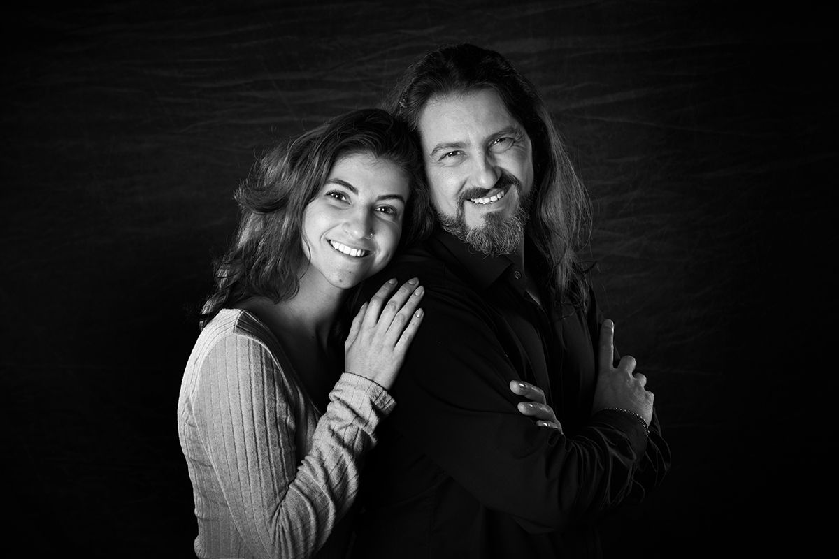 Daughter & Father posing for a portrait session at Oakley Studios on the Luton and Dunstable border, Bedfordshire