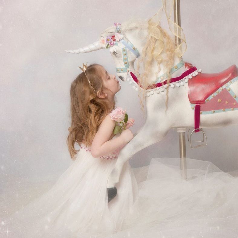 Young child in a unicorn costume during the Mermaids and Unicorns fantasy photoshoot at Oakley Studios, Luton