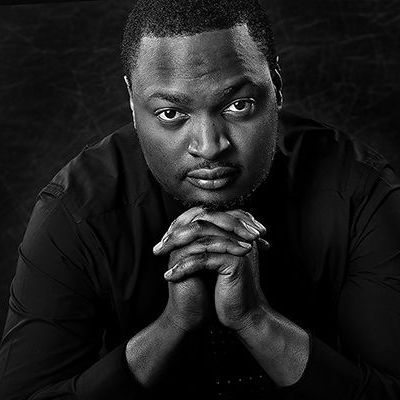 Award-winning close-up headshot of a man — professional portrait photography by Oakley Studios, Luton