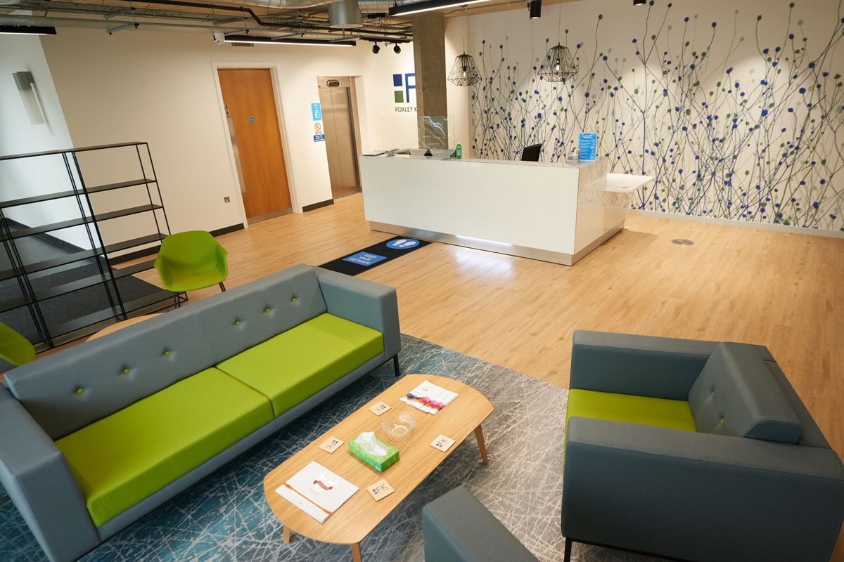 Foxley Kingham Accountants modern office lounge area — interior business photography by Oakley Studios, Luton