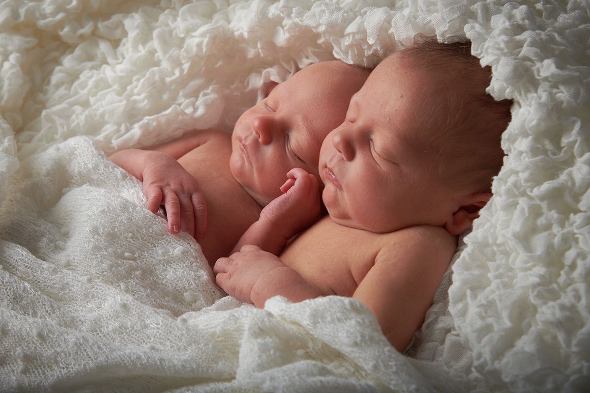 Newborn twins before professional retouching — Oakley Studios newborn photography editing process, Luton