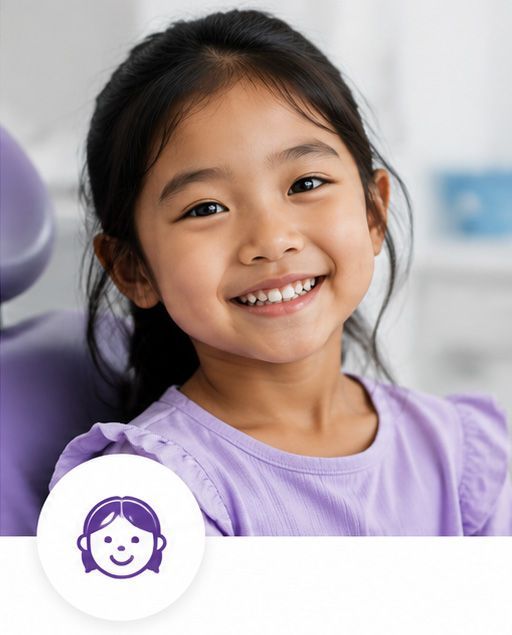 Smiling child in a lavender shirt against a soft blurred background