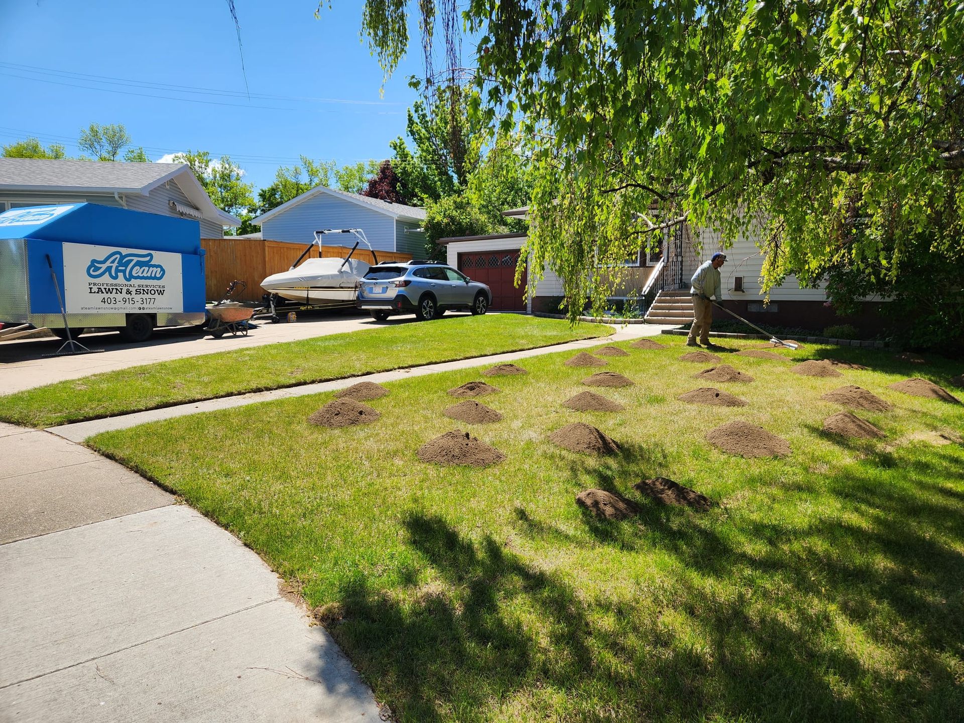 House with a green lawn.