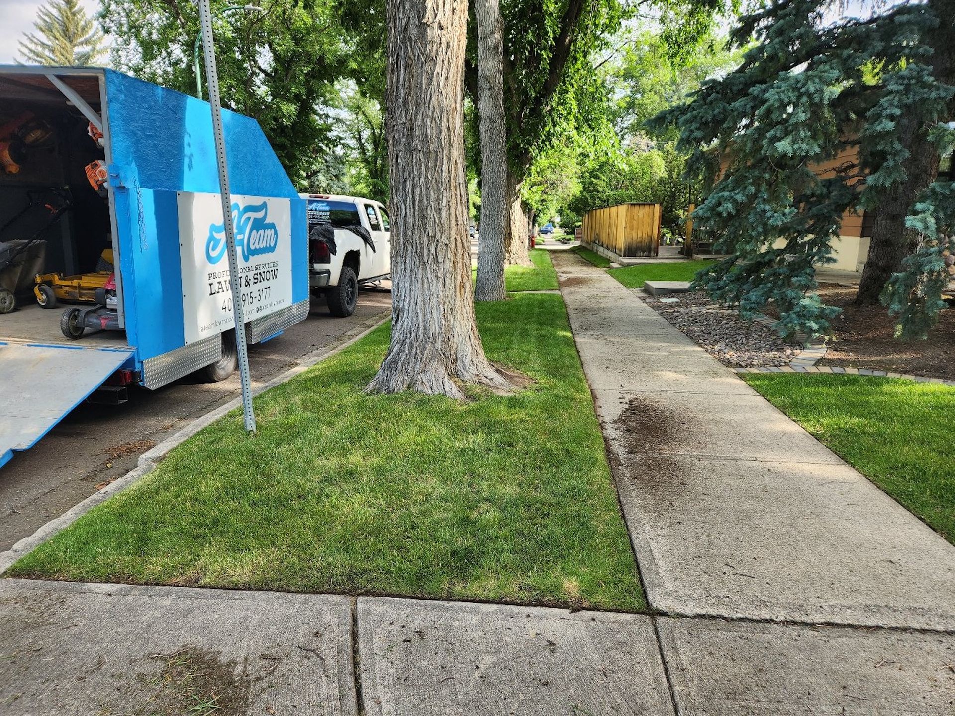 A team trailer parked on a street.