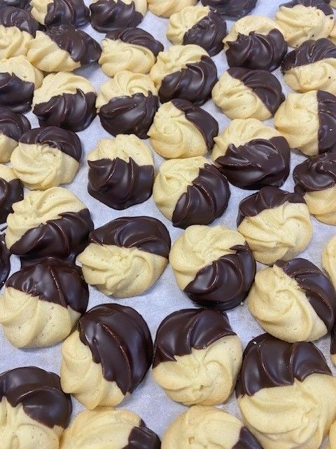 Butter cookies dipped in dark chocolate.