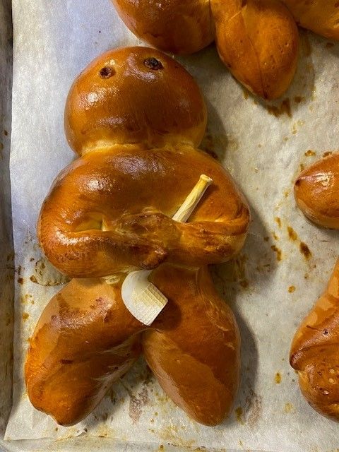 Baked dough figure with a vegetable 