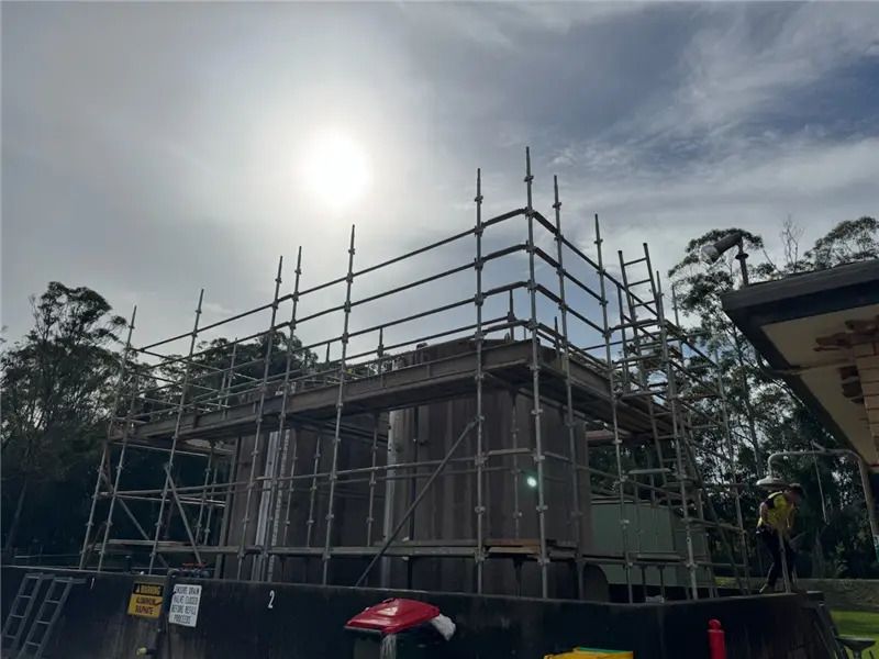 A large building under construction with a lot of scaffolding on it — Triple S Scaffolding In Port Macquarie, NSW