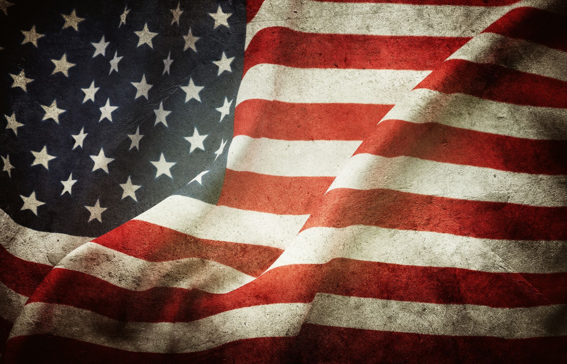 Waving American flag with stars and red-and-white stripes