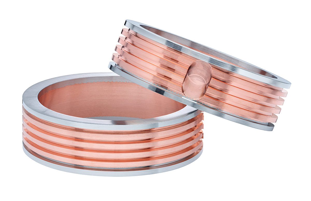 Two bonded bimetal stainless steel/copper/stainless steel fittings used for heat extraction in cryogenics.