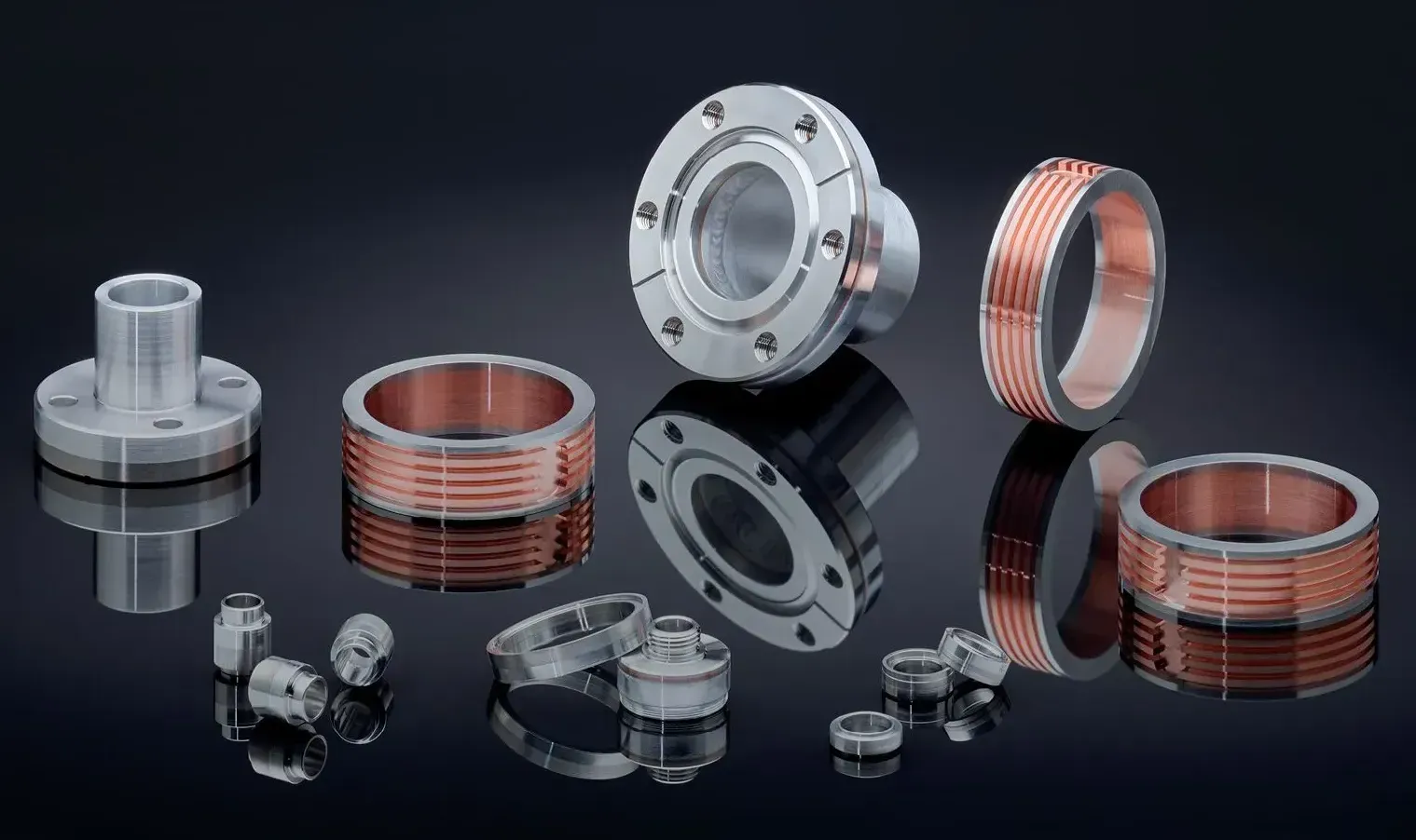 A collection of bonded bimetal flanges and fittings using aluminum, copper, niobium, titanium, stainless steel.