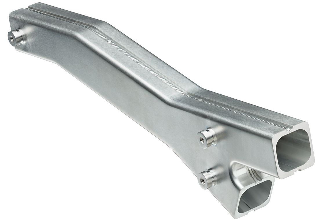 Aluminum, side-seam welded chamber, Y-shaped to bend electrons.