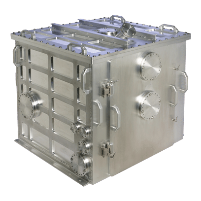 A 4-foot cube shaped vacuum chamber with access ports and doors used for NASA in-flight testing of metal 3D printing.