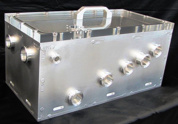 Rectangular aluminum chamber with polycarbonate lid with o ring groove machined in.