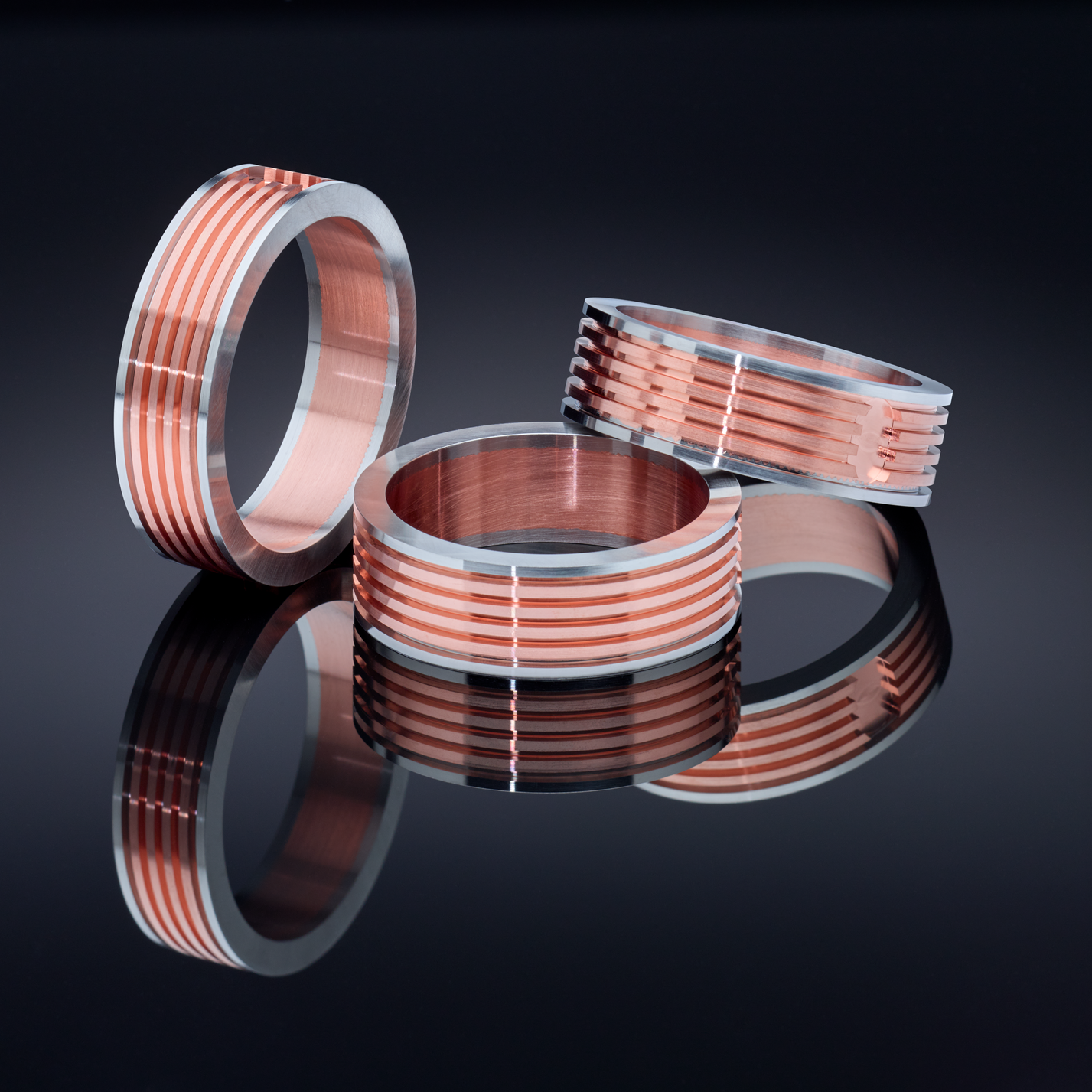 Three bimetal stainless steel/copper/stainless steel couplings for cryogenic heat extraction.