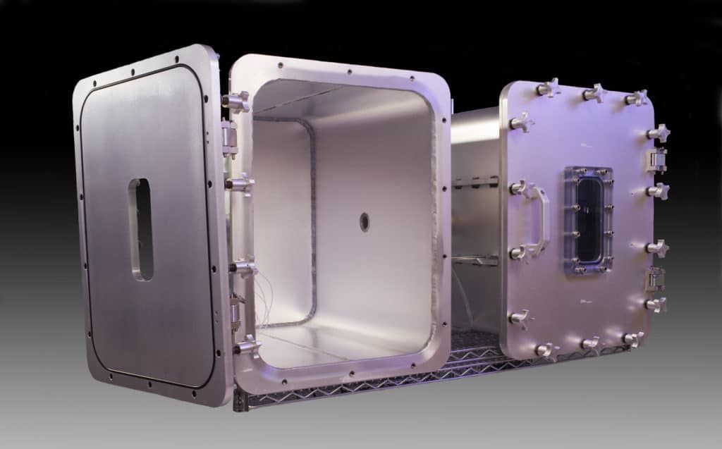Aluminum R&D chambers for fresh fruits and flowers under hypobaric conditions to extend shelf life 10X, one with door open.
