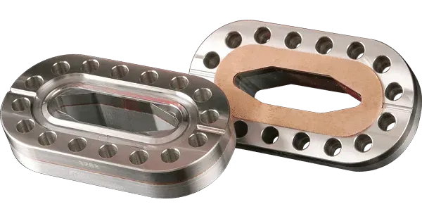 Custom racetrack shaped bimetal conflat flange with custom gasket for beamline RF accelerator .