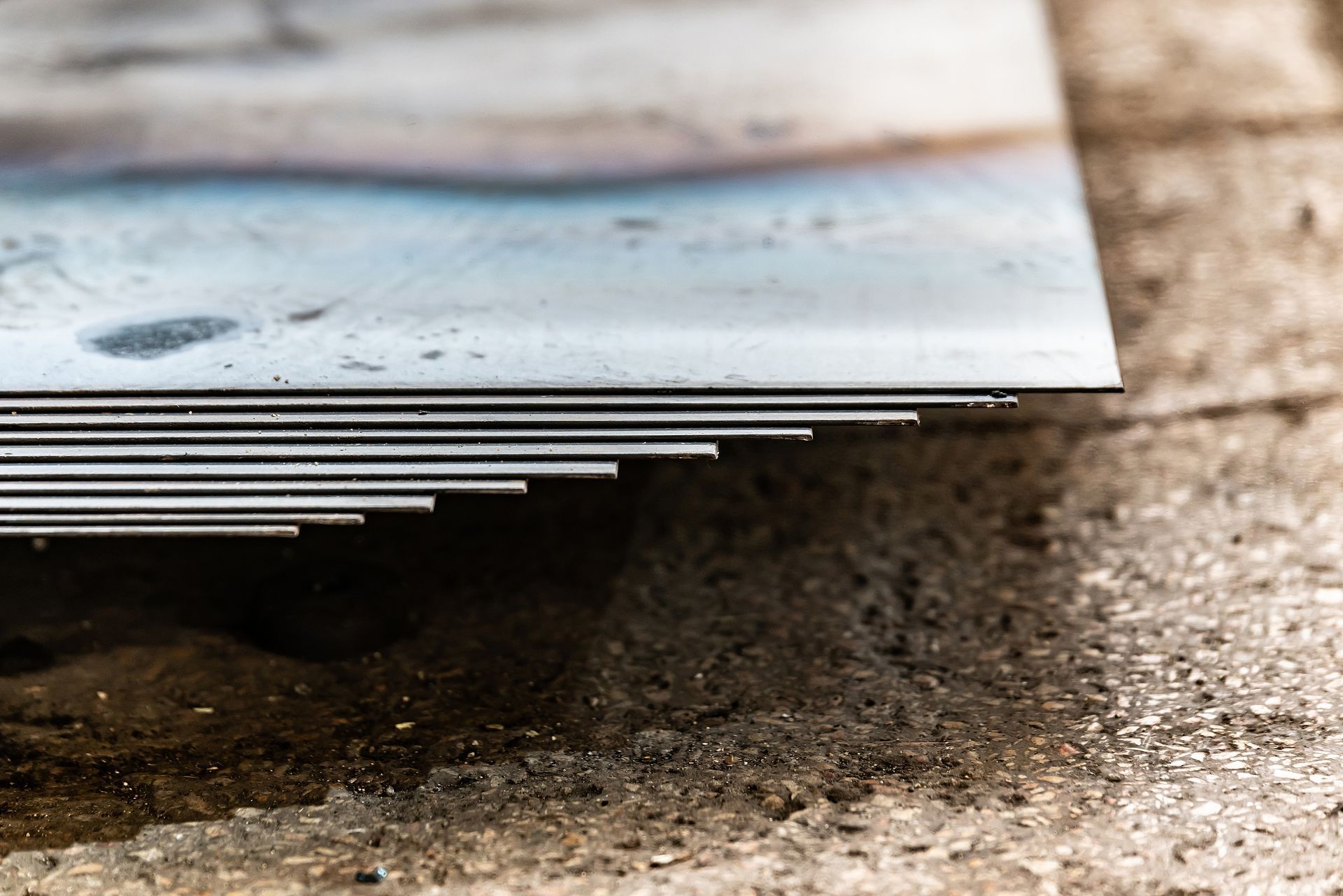 Close-up of the corner of some sheet metal stacked together