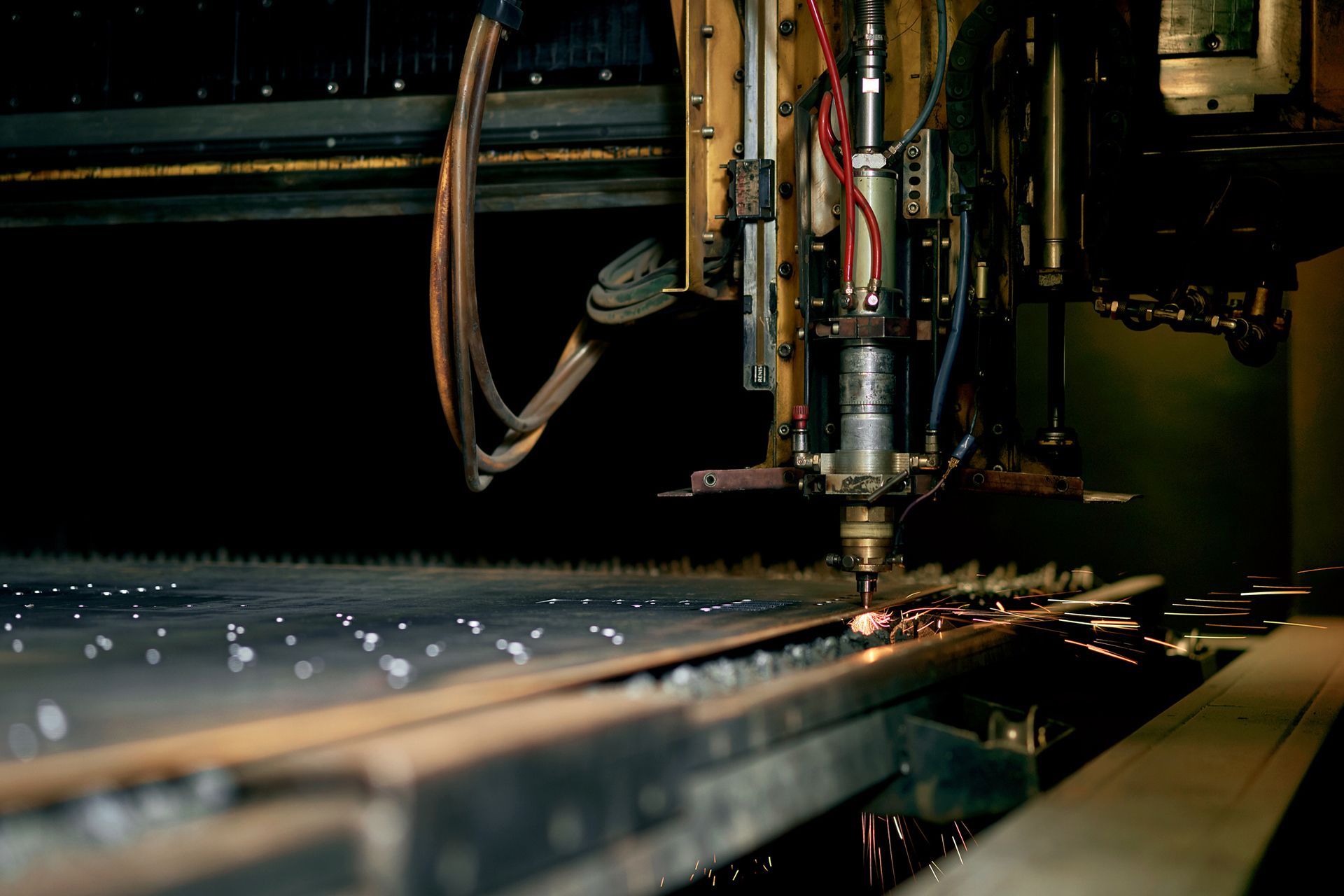 Laser work on a metal-cutting machine.