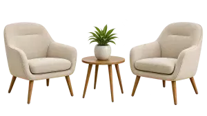 Two beige armchairs flanking a small wooden table with a potted plant