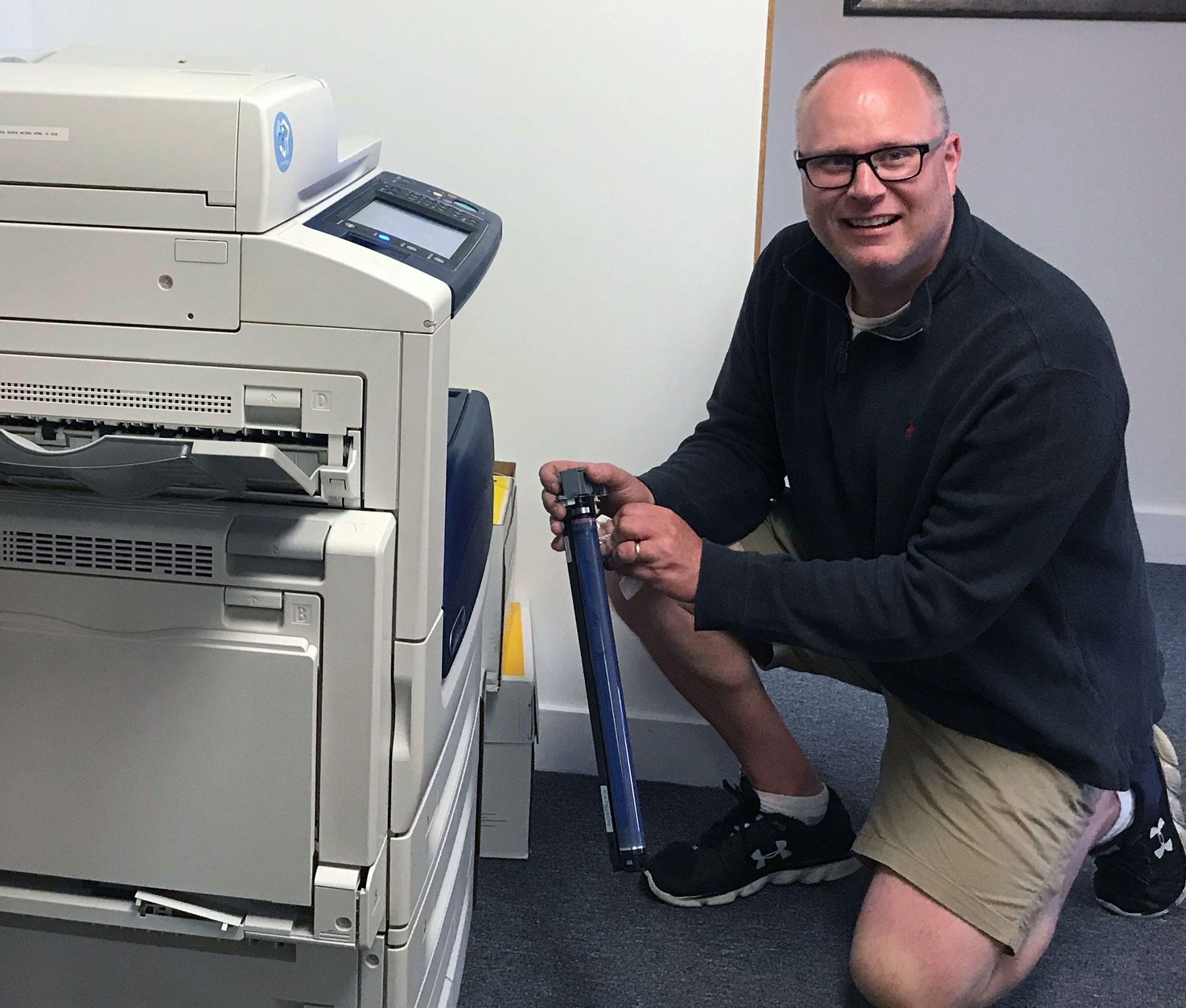 Joel Carrara replacing copier mother board