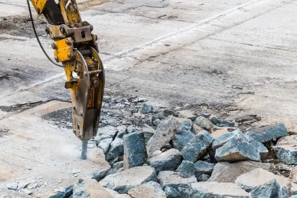 Professional concrete demolition and cleanup.