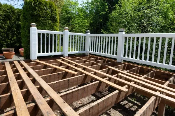 Demolishing an old residential deck.