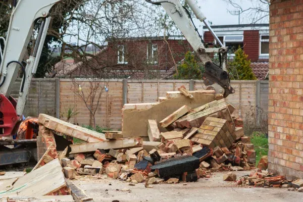 Professional garage demolition and debris removal.