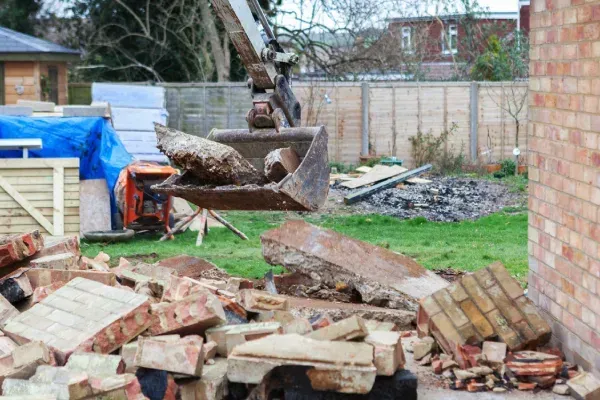 Demolishing an old residential garage.
