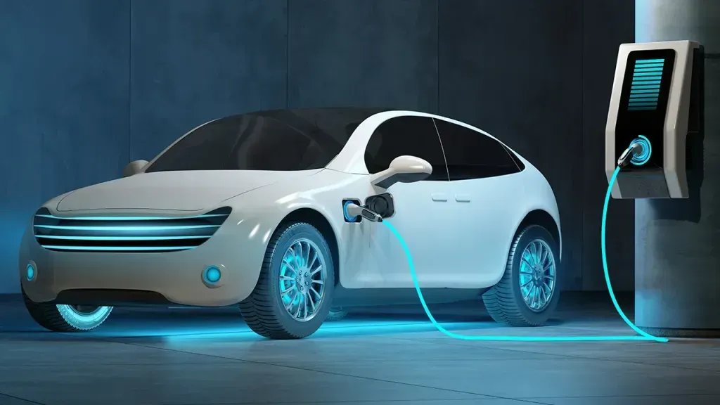 Carro eléctrico cargando energía mediante una estación de carga alimentada con paneles solares de SOLMIC.