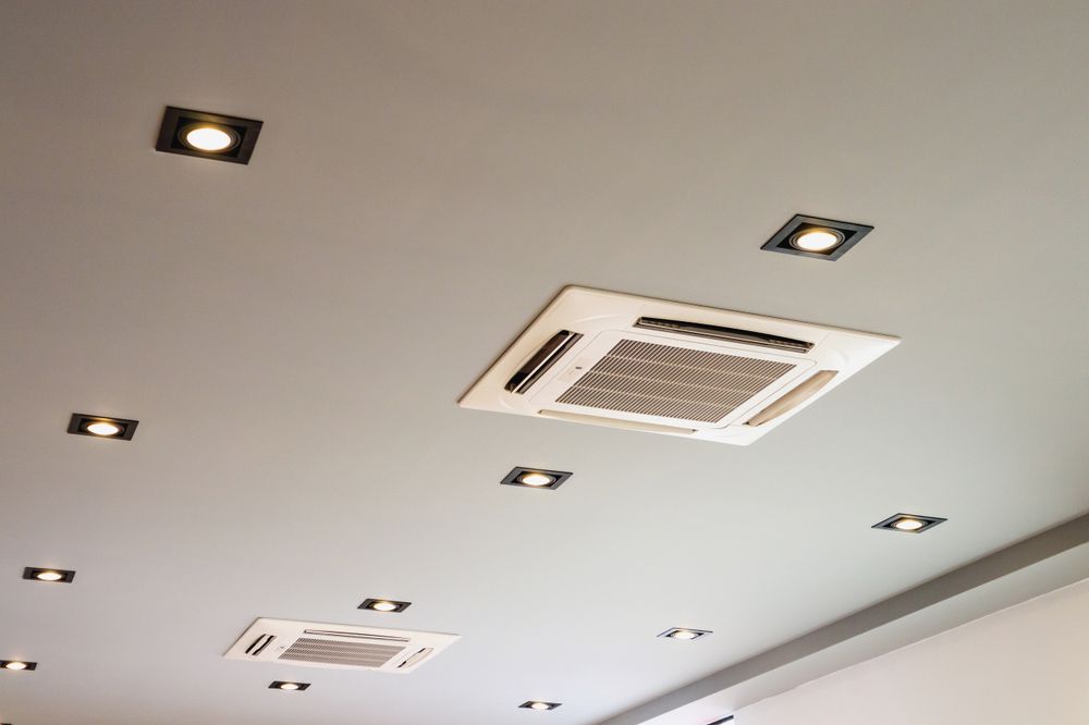 White Ceiling With Recessed Lights and Two Square AC Vents — A & T Air-Conditioning and Refrigeration in Millbank, QLD