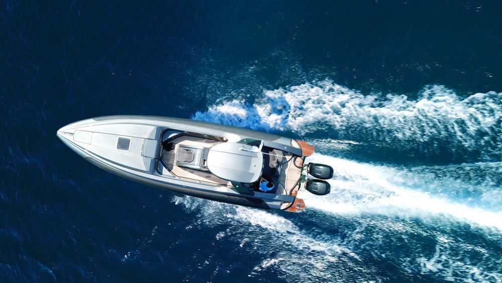 A small boat is driving on the ocean — ElectroMech Machine in Woolner, NT