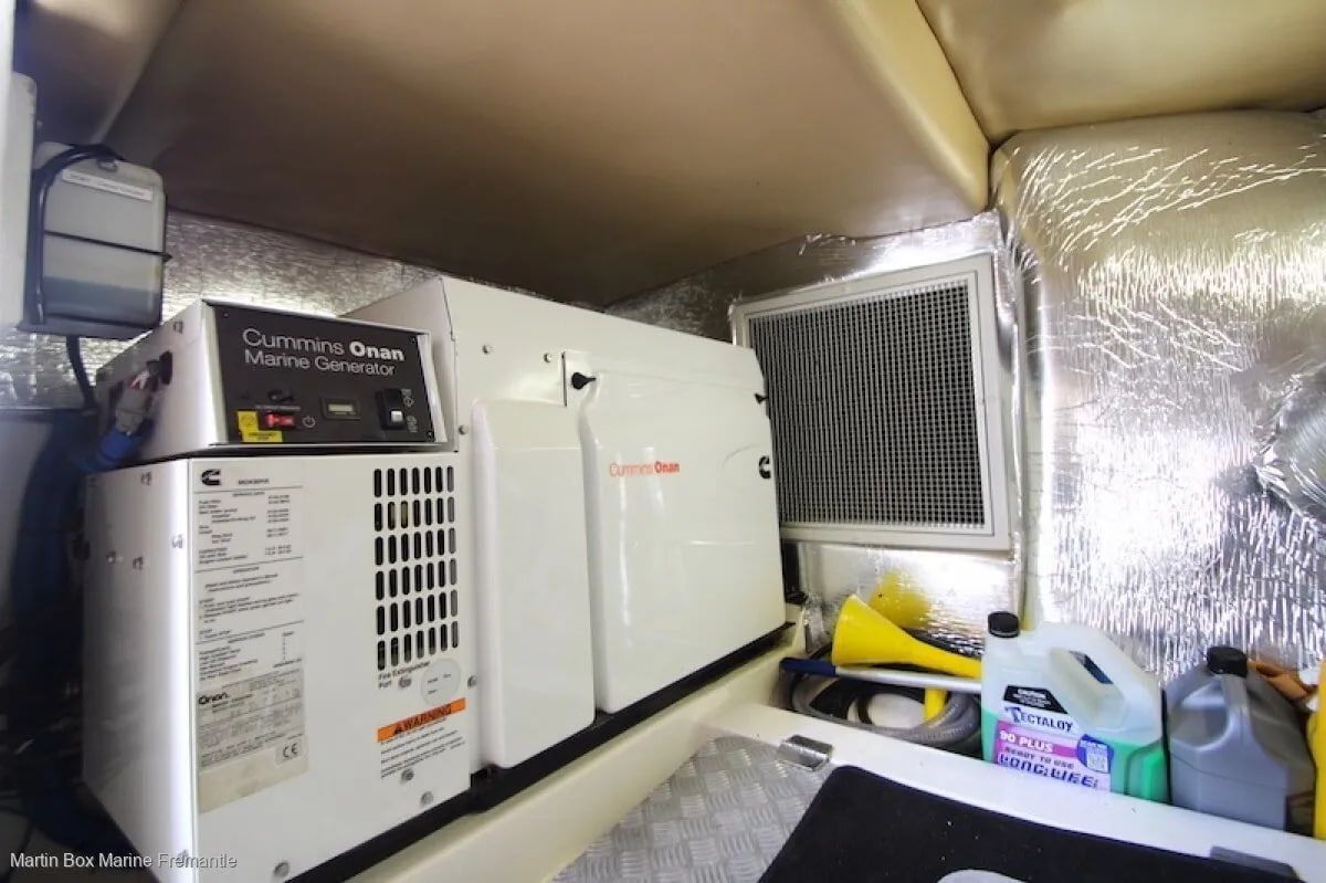 Generator and related equipment inside a boat's enclosed compartment — ElectroMech Machine in Woolner, NT