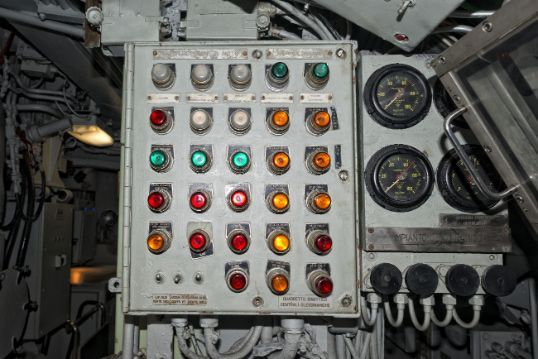 A Control Panel With a Bunch of Lights and Gauges on It — ElectroMech Machine in Woolner, NT