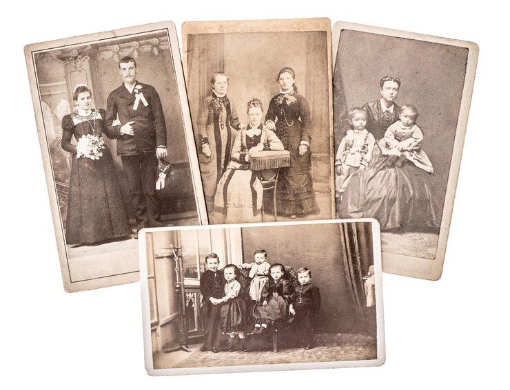 A group of old black and white photos of a family.