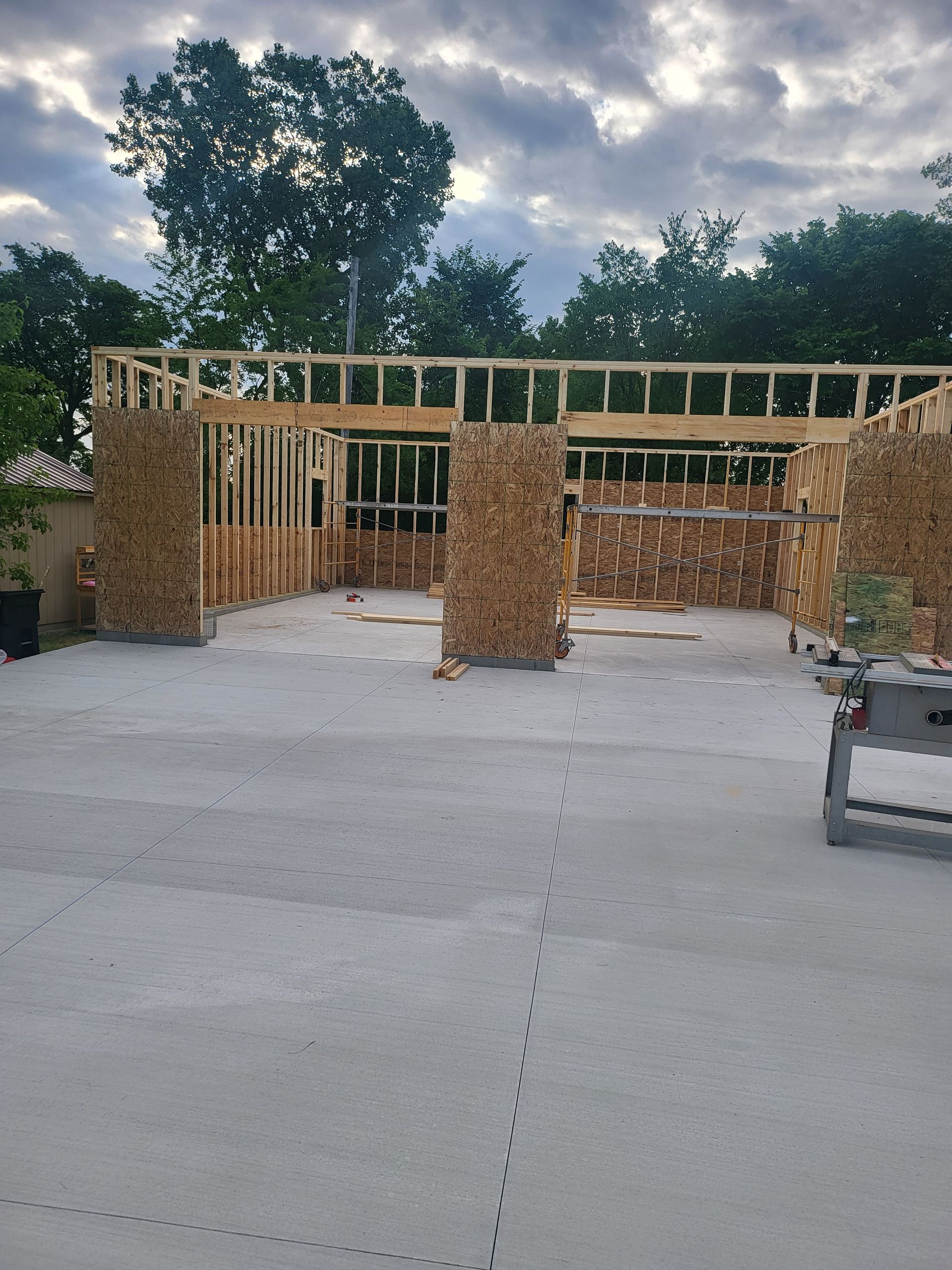 A garage that is being built with wood