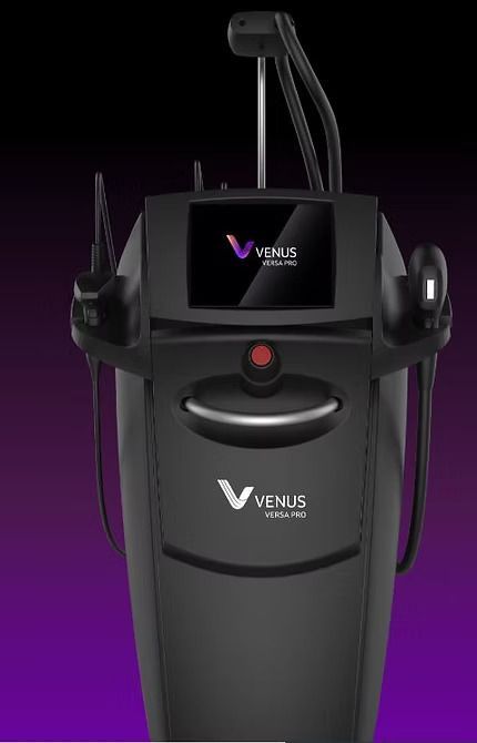 Black Venus Versa machine with touchscreen and applicator attachments, against a purple backdrop.