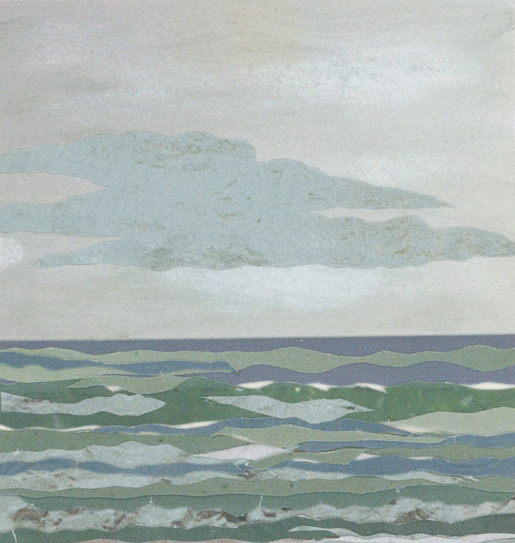Sea scene with green and blue waves under a cloudy sky.