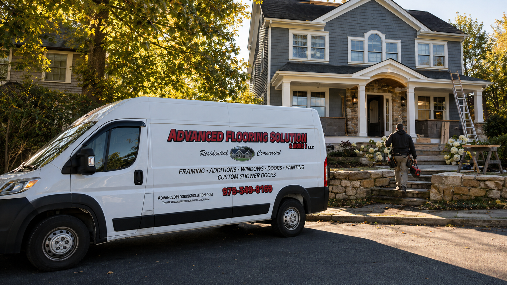 White work van parked outside a blue house while a person stands on the front steps.