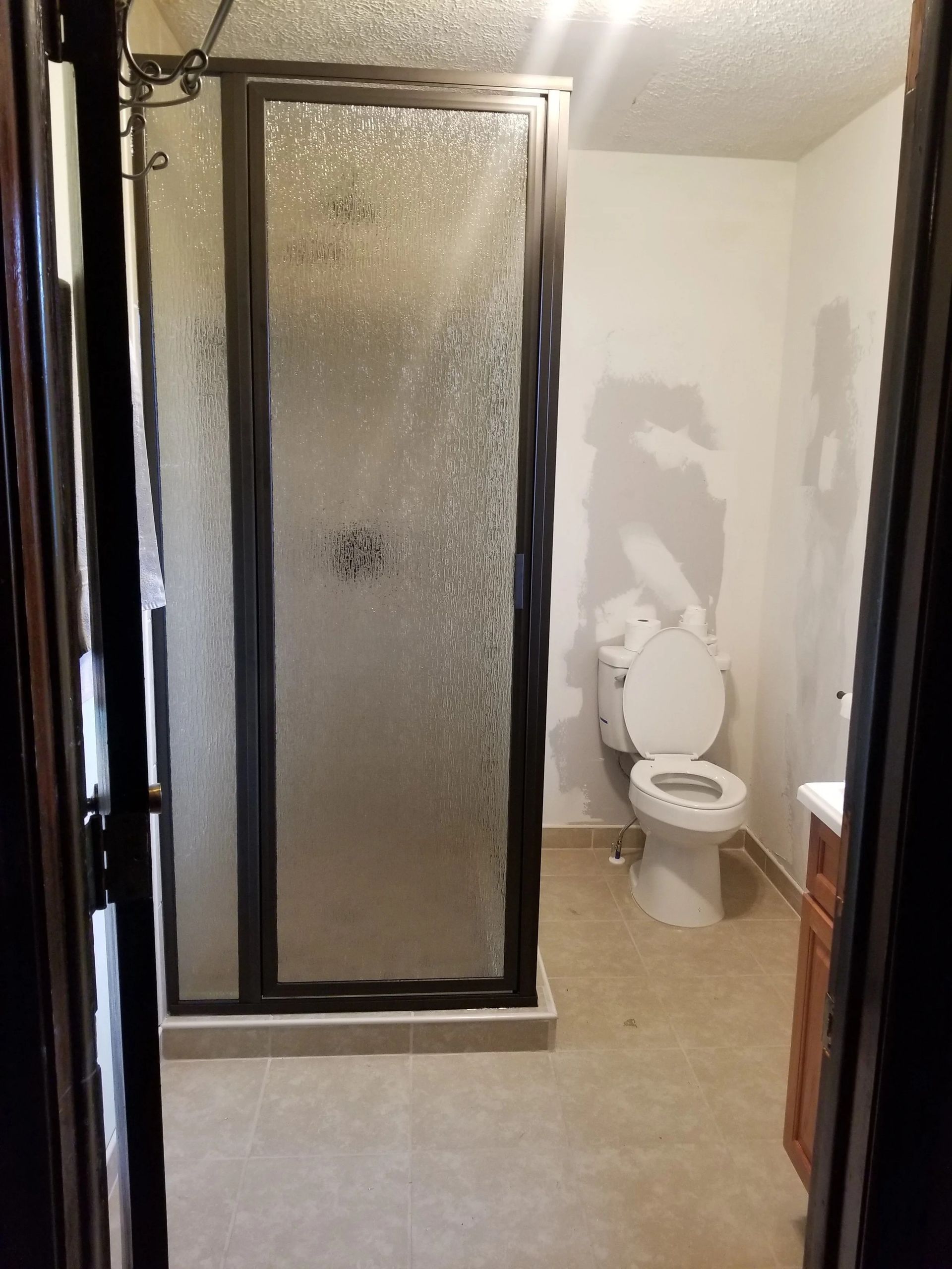 Bathroom remodel tile work by Christ Powered Construction