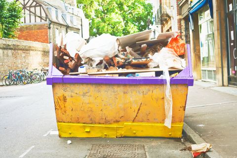 building debris in the dumpster