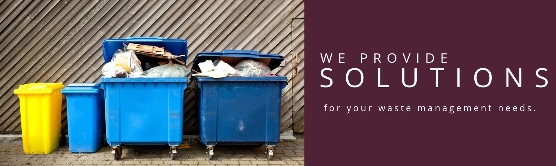 Blue and yellow recycling bins lined up beside text: “We provide solutions for your waste management needs.”