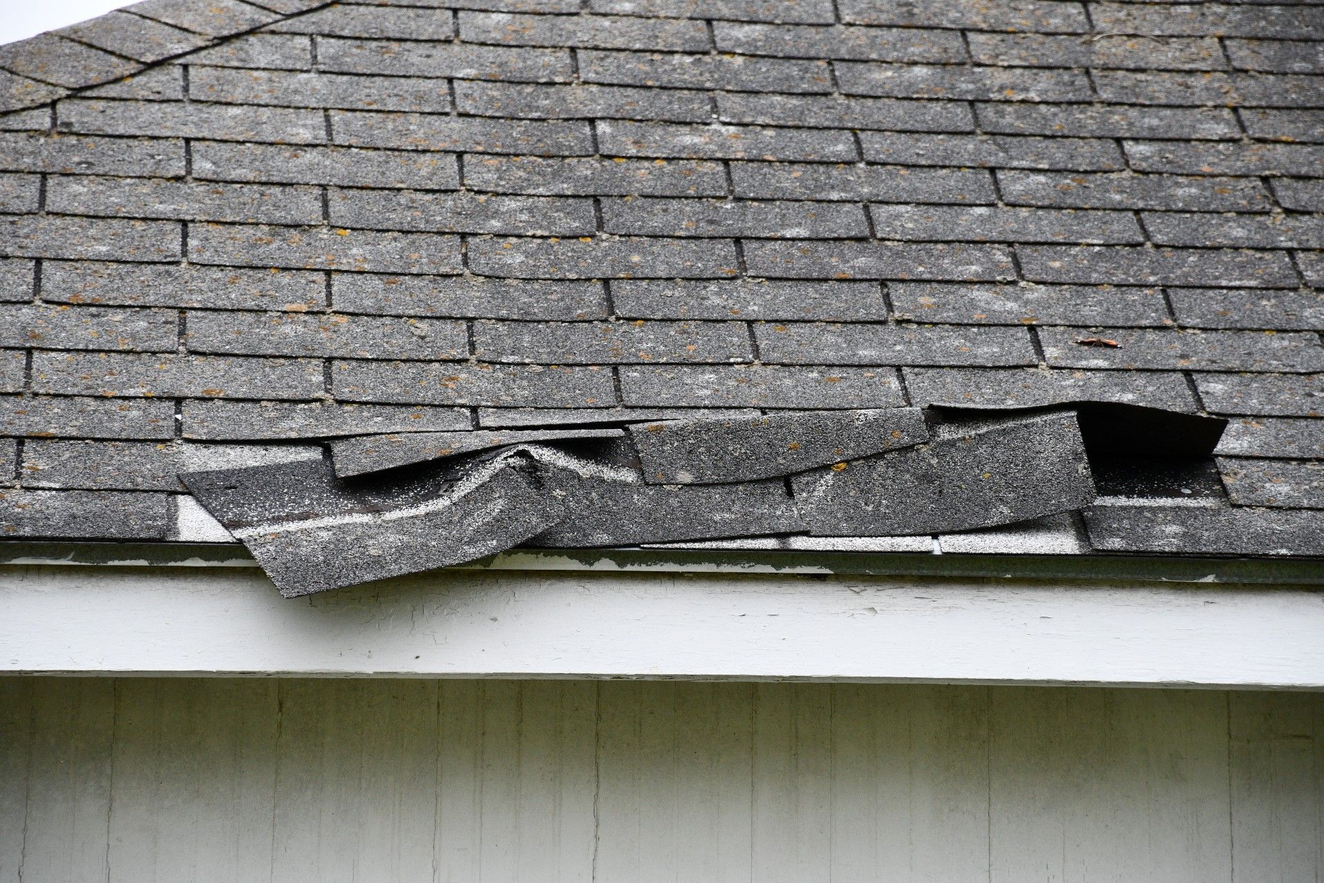 A close up of a roof with a hole in it.