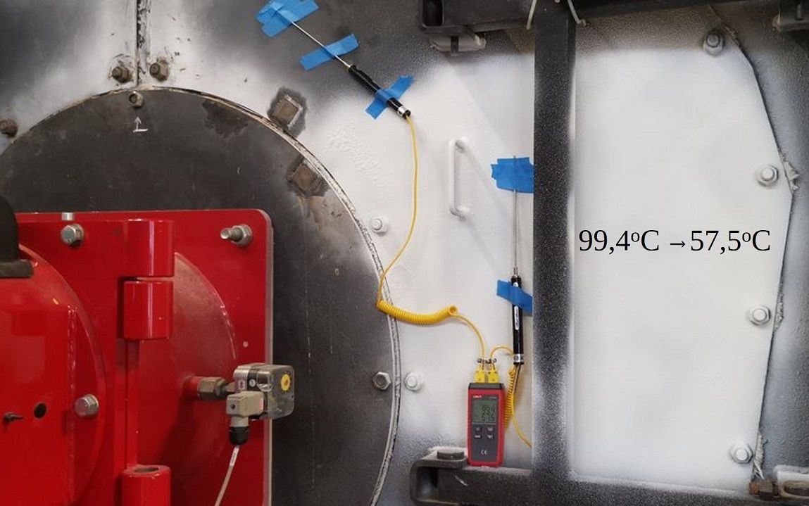 Thermocouples taped to a metal surface with a temperature reading. Red object on the left.