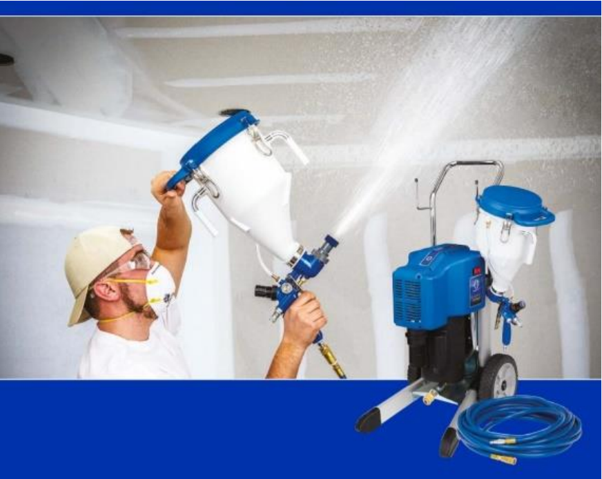 Man sprays textured ceiling with blue machine, wearing safety gear.