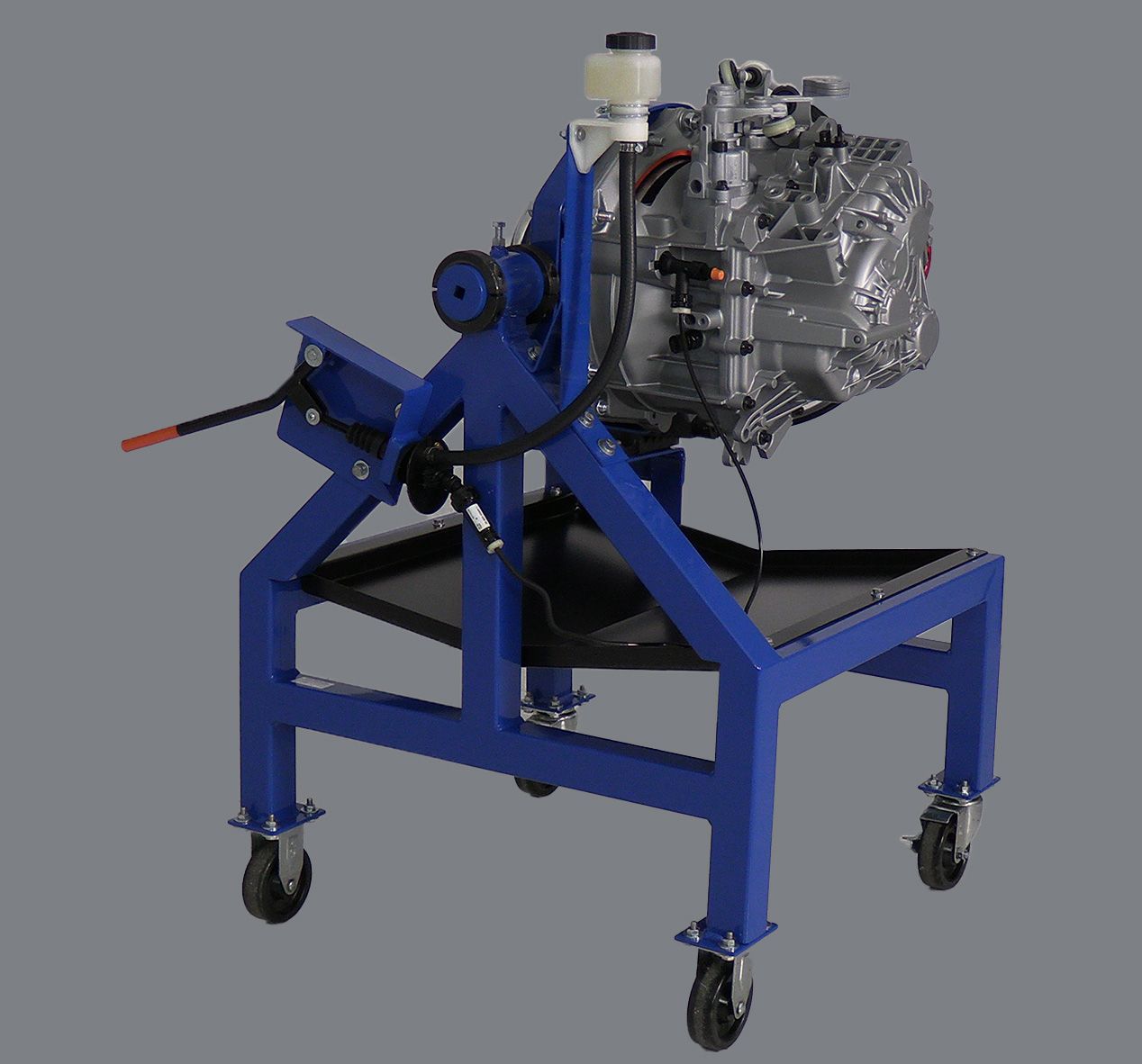 A machine is sitting on a blue stand with wheels